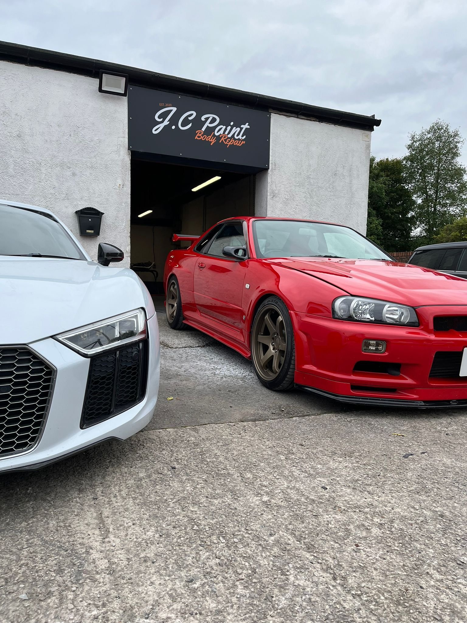 Custom car bodywork Wirral with spoiler painting and fitting